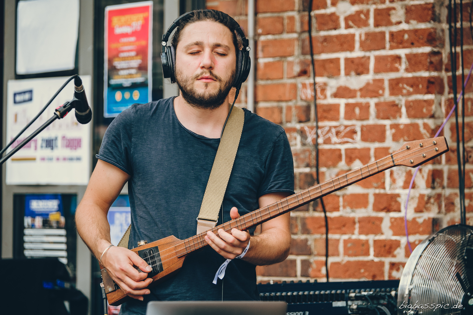 with a stringed instrument